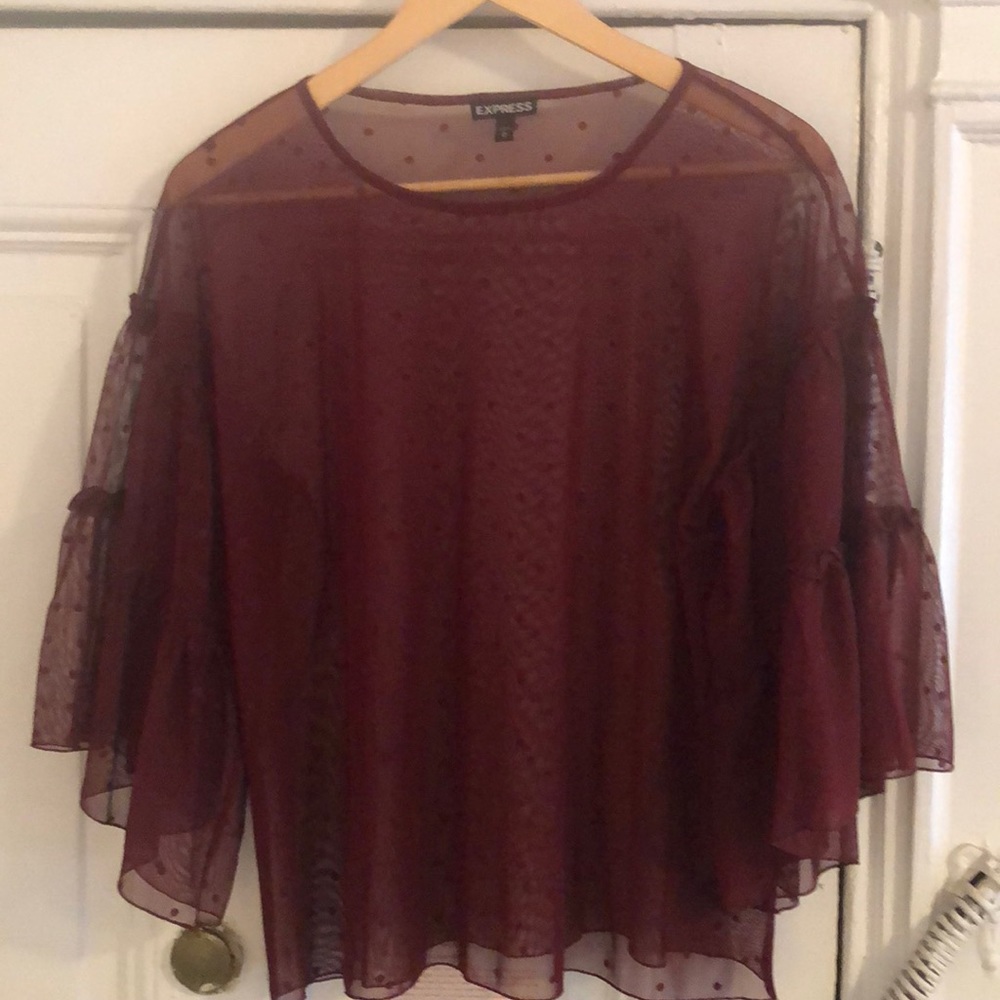 Sheer polka dotted maroon top
